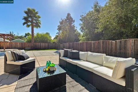 a view of yard with patio