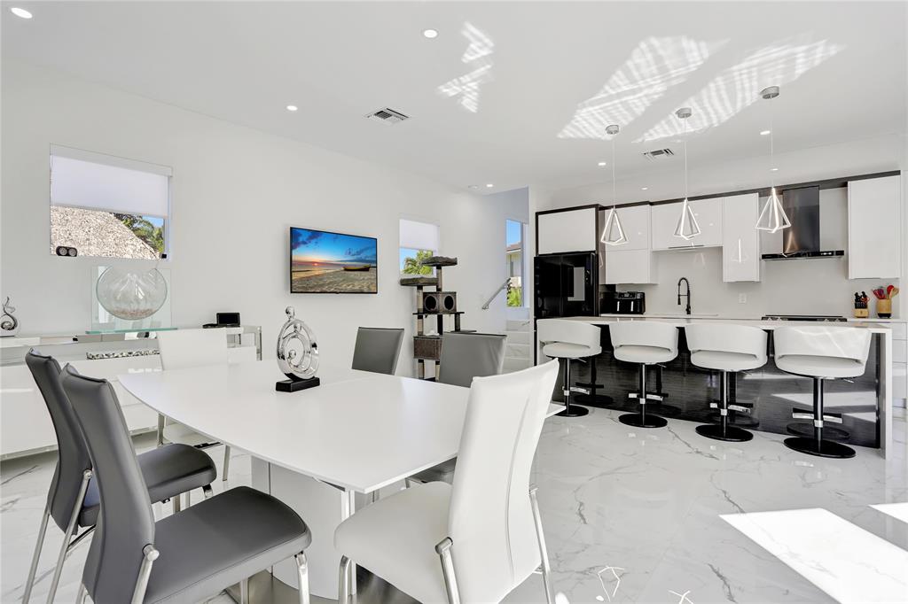 359 Sundial Circle, Unit 359 Margate, FL 33068 - Photo 6 of 36 a view of a dining room with furniture