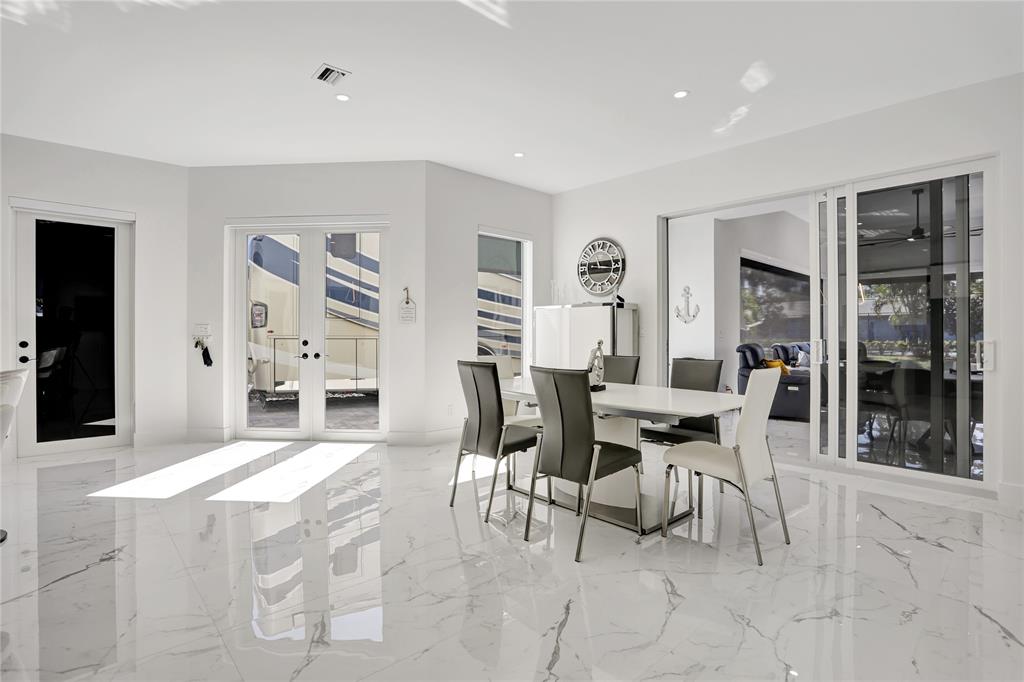 359 Sundial Circle, Unit 359 Margate, FL 33068 - Photo 8 of 36 a view of a dining room with furniture and window