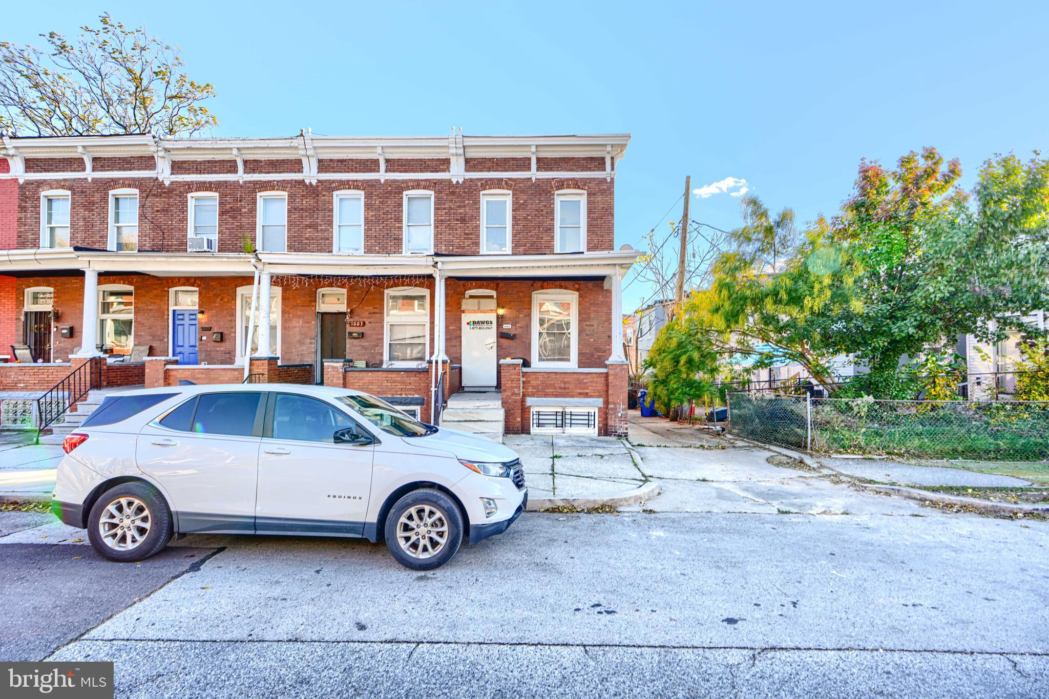 a car parked in front of a house