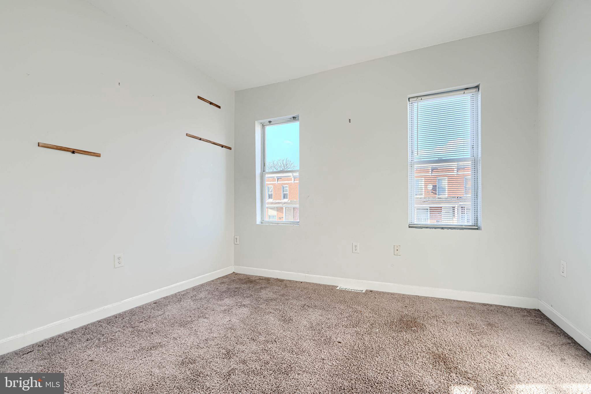 1601 East 28th Street Baltimore, MD 21218 - Photo 26 of 34 an empty room with a window