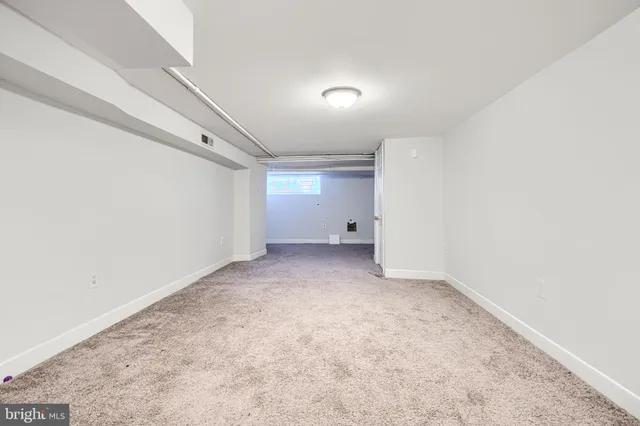 an empty room with a natural light