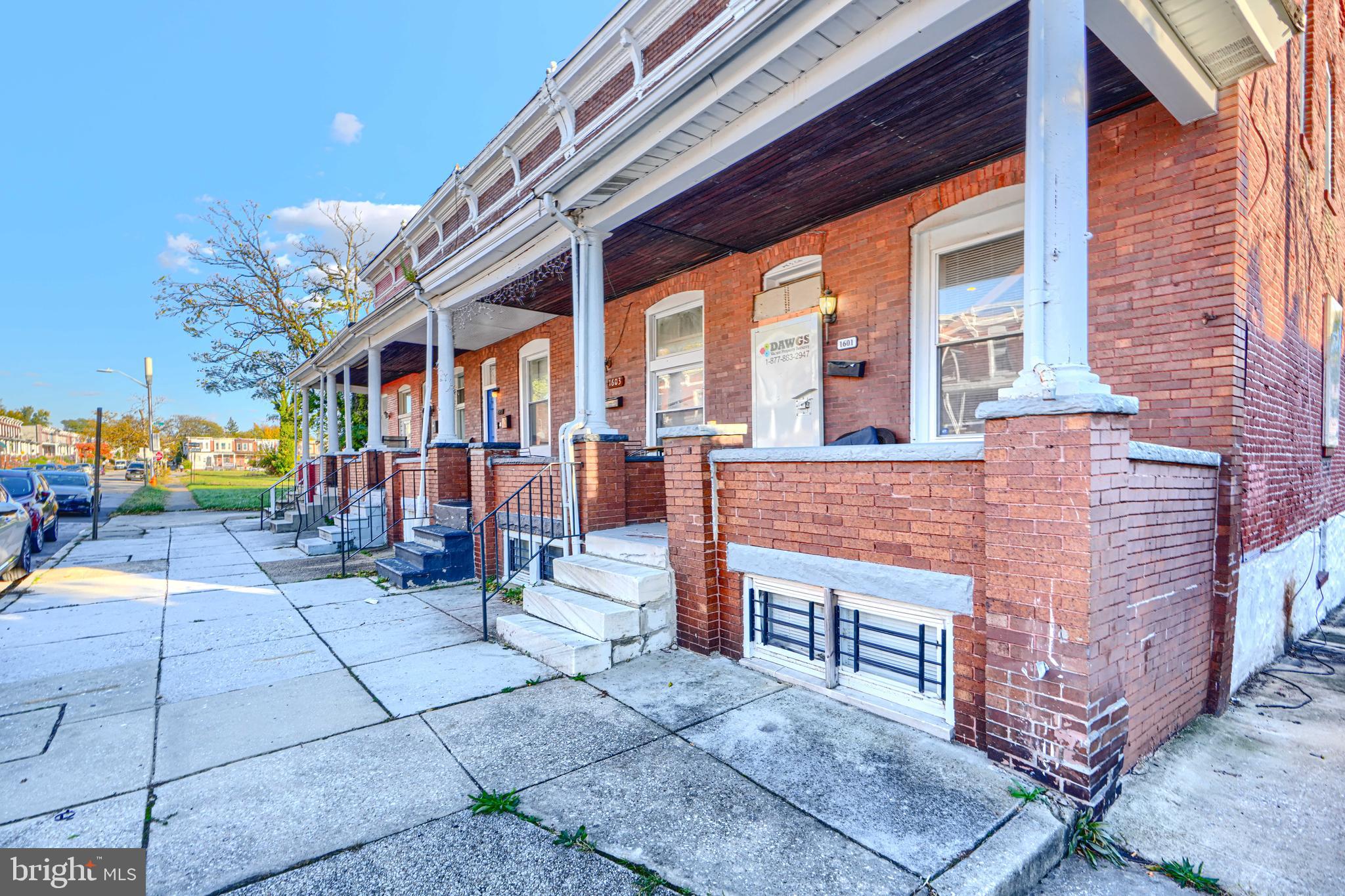 1601 East 28th Street Baltimore, MD 21218 - Photo 3 of 34 a view of a building with sitting area