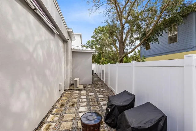a view of a porch with furniture