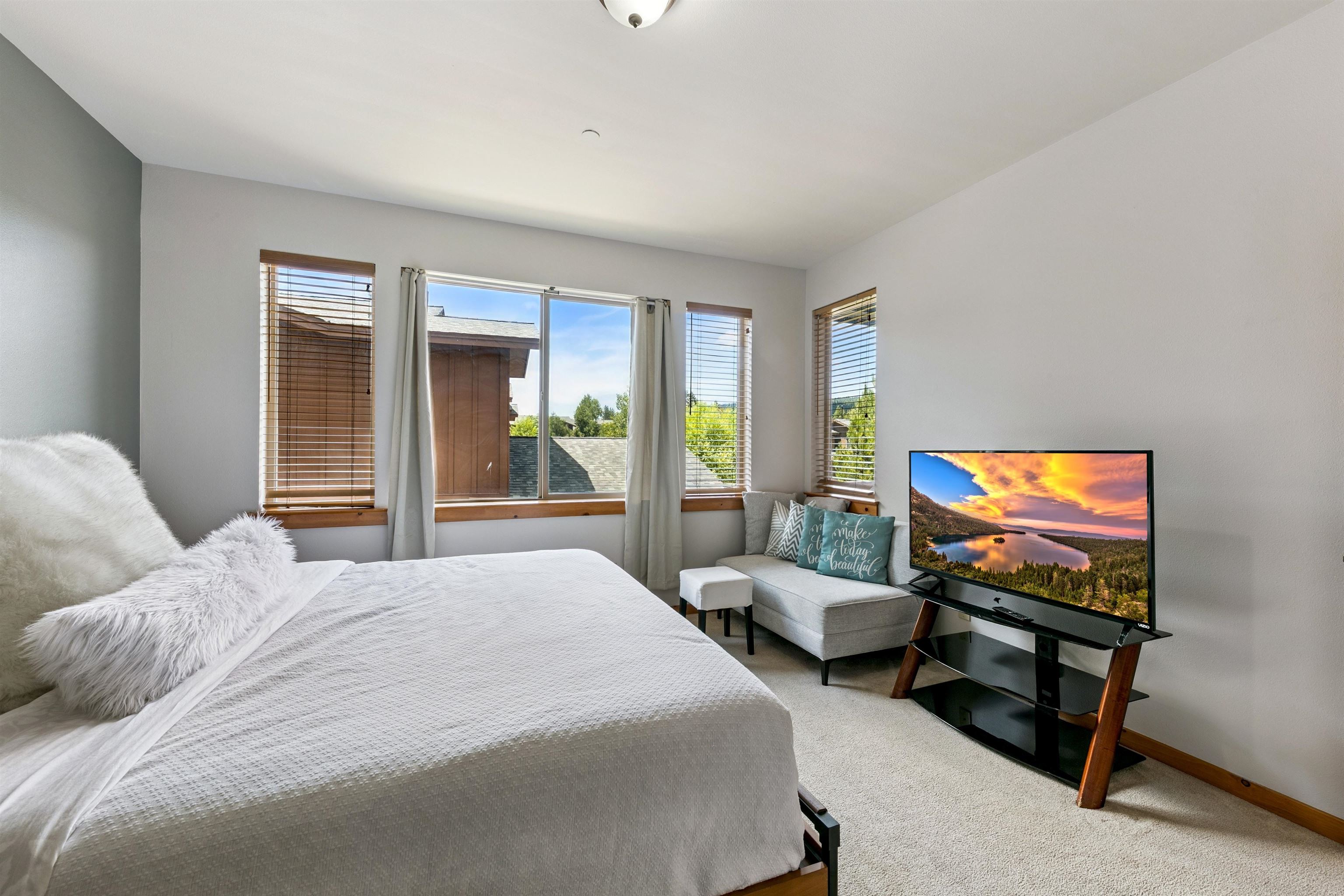 10592 Boulders Road, Unit 8 Truckee, CA 96161 - Photo 14 of 27 a bedroom with two beds and a flat screen tv
