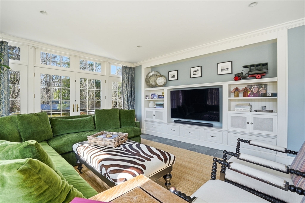 65 Partridge Road Duxbury, MA 02332 - Photo 13 of 42 a living room with furniture and a flat screen tv