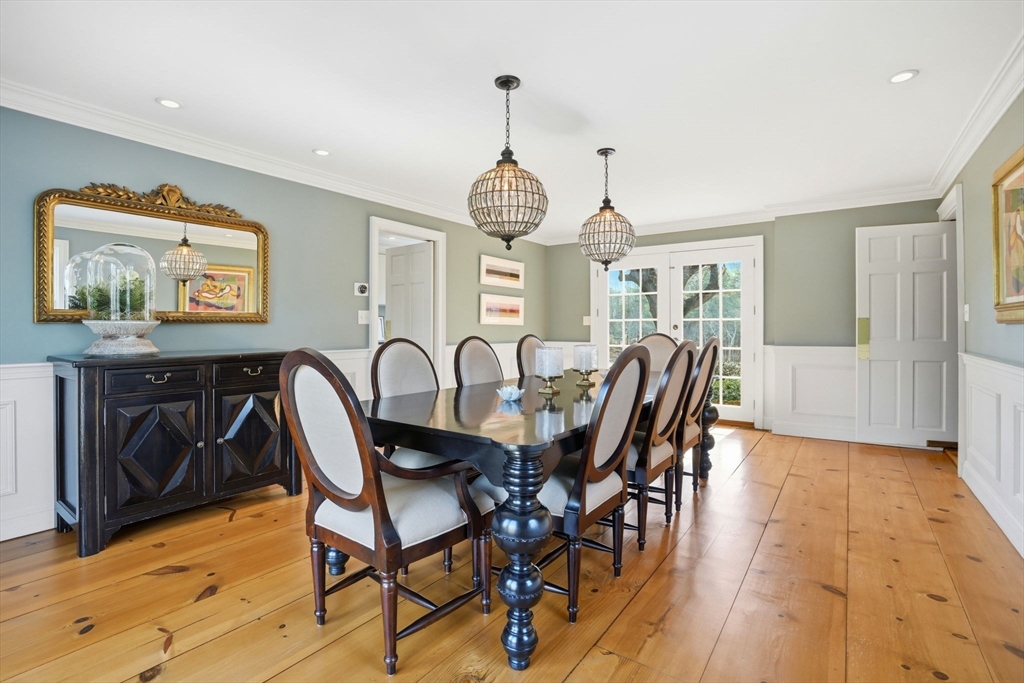 65 Partridge Road Duxbury, MA 02332 - Photo 16 of 42 a view of a a dining room with furniture window and wooden floor