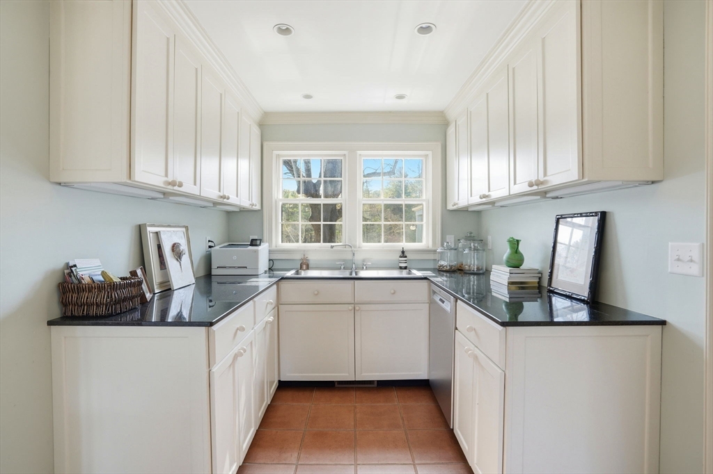 65 Partridge Road Duxbury, MA 02332 - Photo 18 of 42 a kitchen with stainless steel appliances a sink stove and cabinets