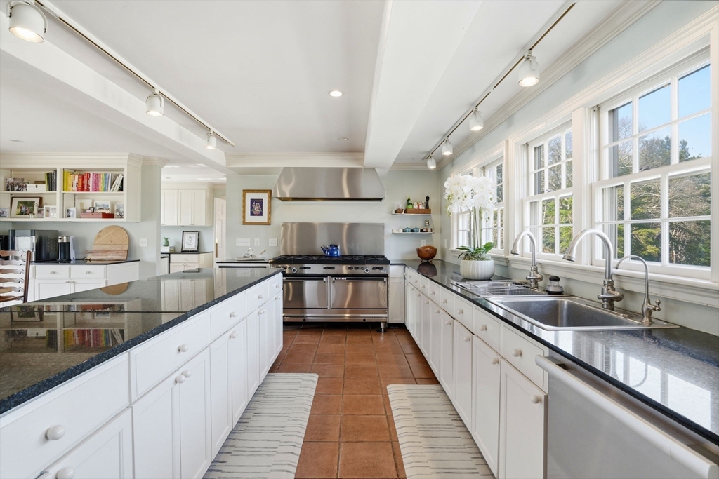 65 Partridge Road Duxbury, MA 02332 - Photo 20 of 42 a large kitchen with stainless steel appliances lots of counter space and a sink
