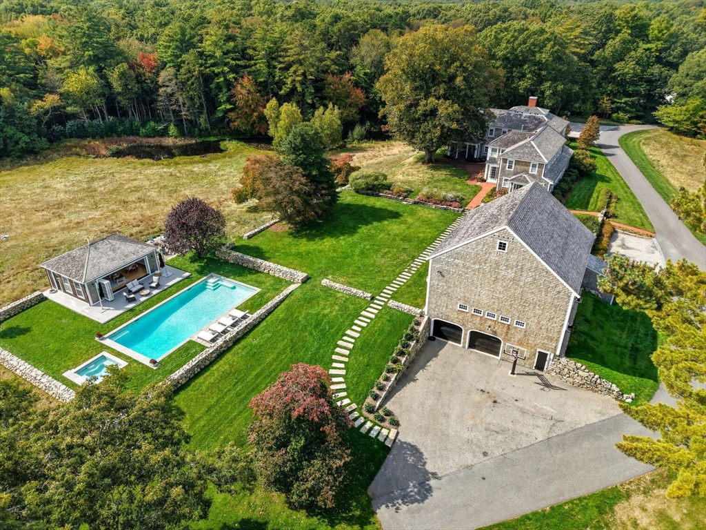 65 Partridge Road Duxbury, MA 02332 - Photo 3 of 42 an aerial view of a house with a garden and lake view