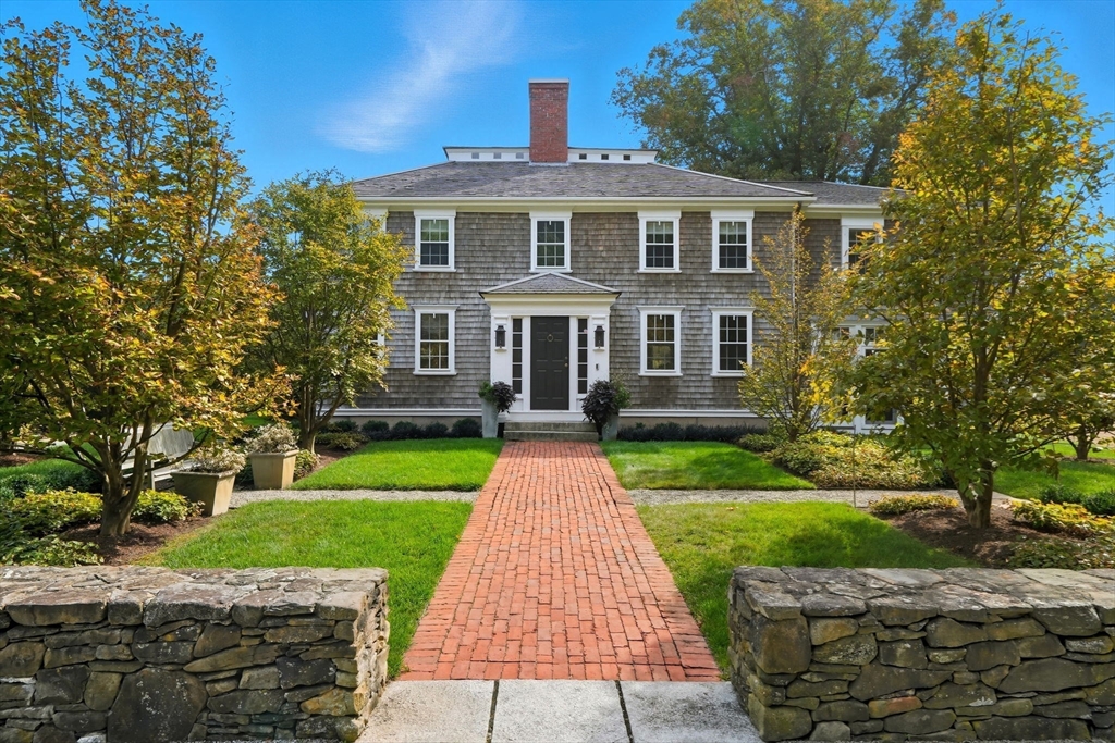 65 Partridge Road Duxbury, MA 02332 - Photo 5 of 42 front view of a house next to a yard