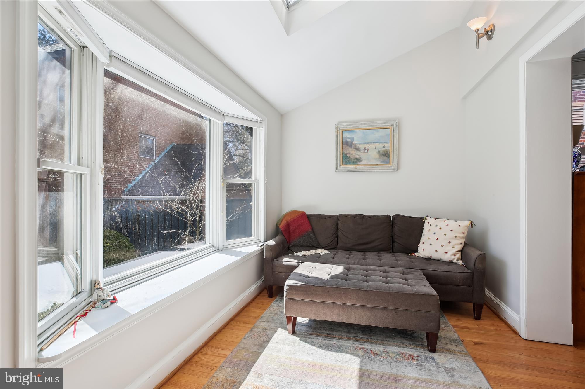 3530 Quesada Street Northwest Washington, DC 20015 - Photo 13 of 54 a living room with a couch and a table