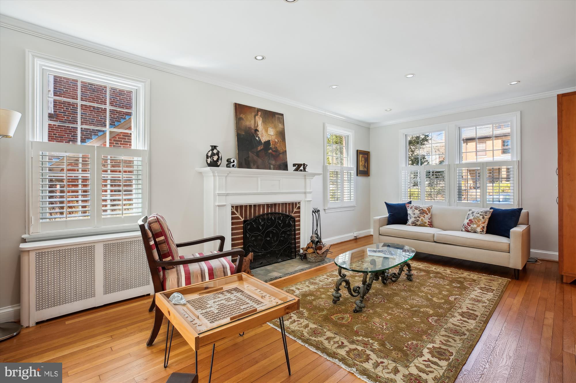 3530 Quesada Street Northwest Washington, DC 20015 - Photo 14 of 54 a living room with furniture and a fireplace
