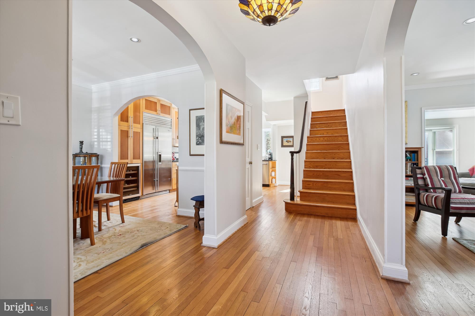 3530 Quesada Street Northwest Washington, DC 20015 - Photo 18 of 54 an empty room with wooden floor and furniture