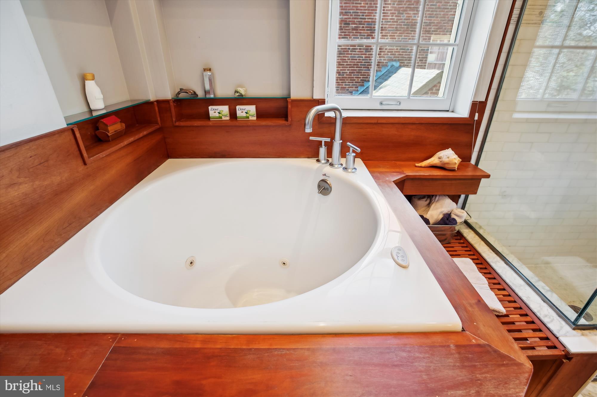 3530 Quesada Street Northwest Washington, DC 20015 - Photo 24 of 54 a bathroom with a bathtub and a window