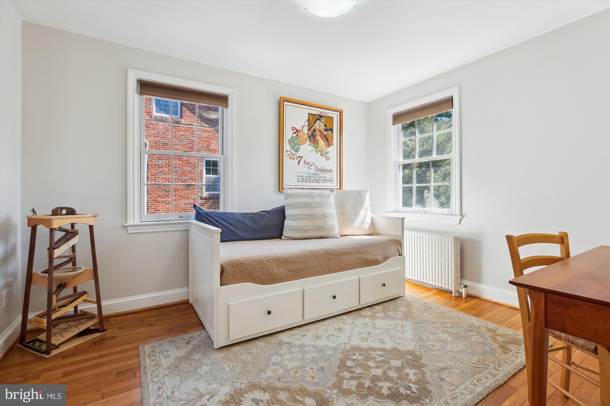 3530 Quesada Street Northwest Washington, DC 20015 - Photo 28 of 54 a bedroom with a bed and a window