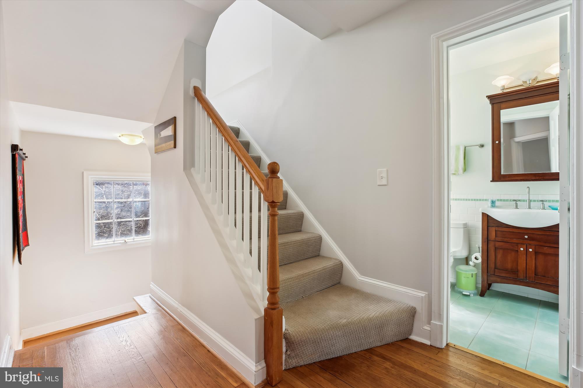 3530 Quesada Street Northwest Washington, DC 20015 - Photo 29 of 54 a view of a hallway with entryway wooden floor and windows