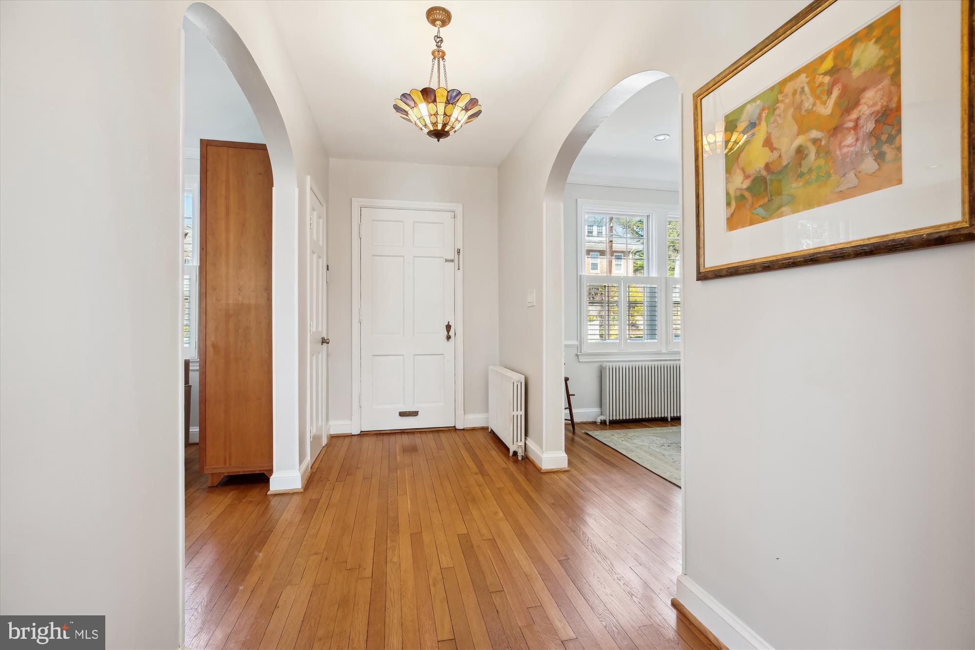 3530 Quesada Street Northwest Washington, DC 20015 - Photo 3 of 54 a view of empty room with wooden floor