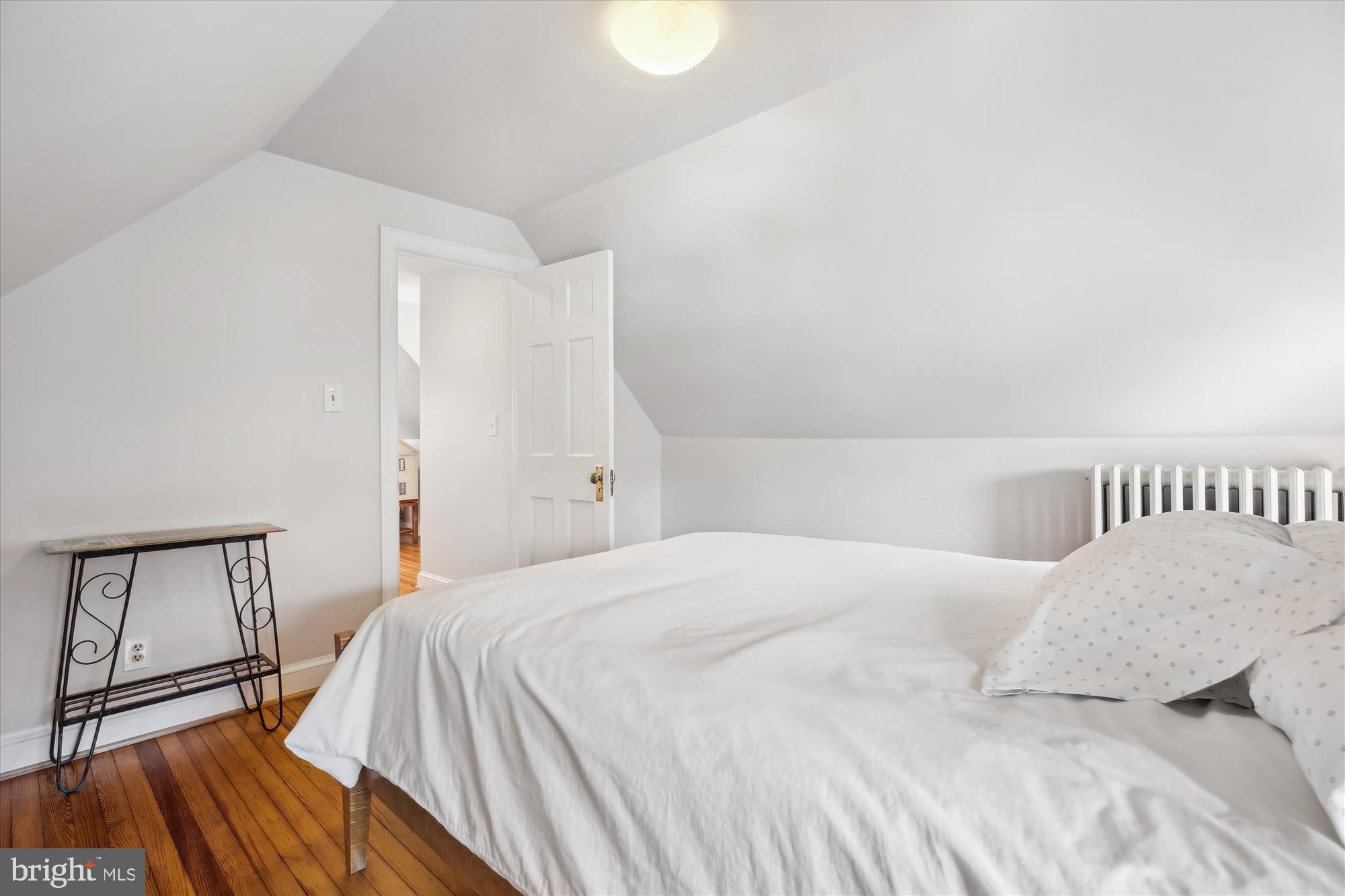 3530 Quesada Street Northwest Washington, DC 20015 - Photo 33 of 54 a bedroom with a bed and a window