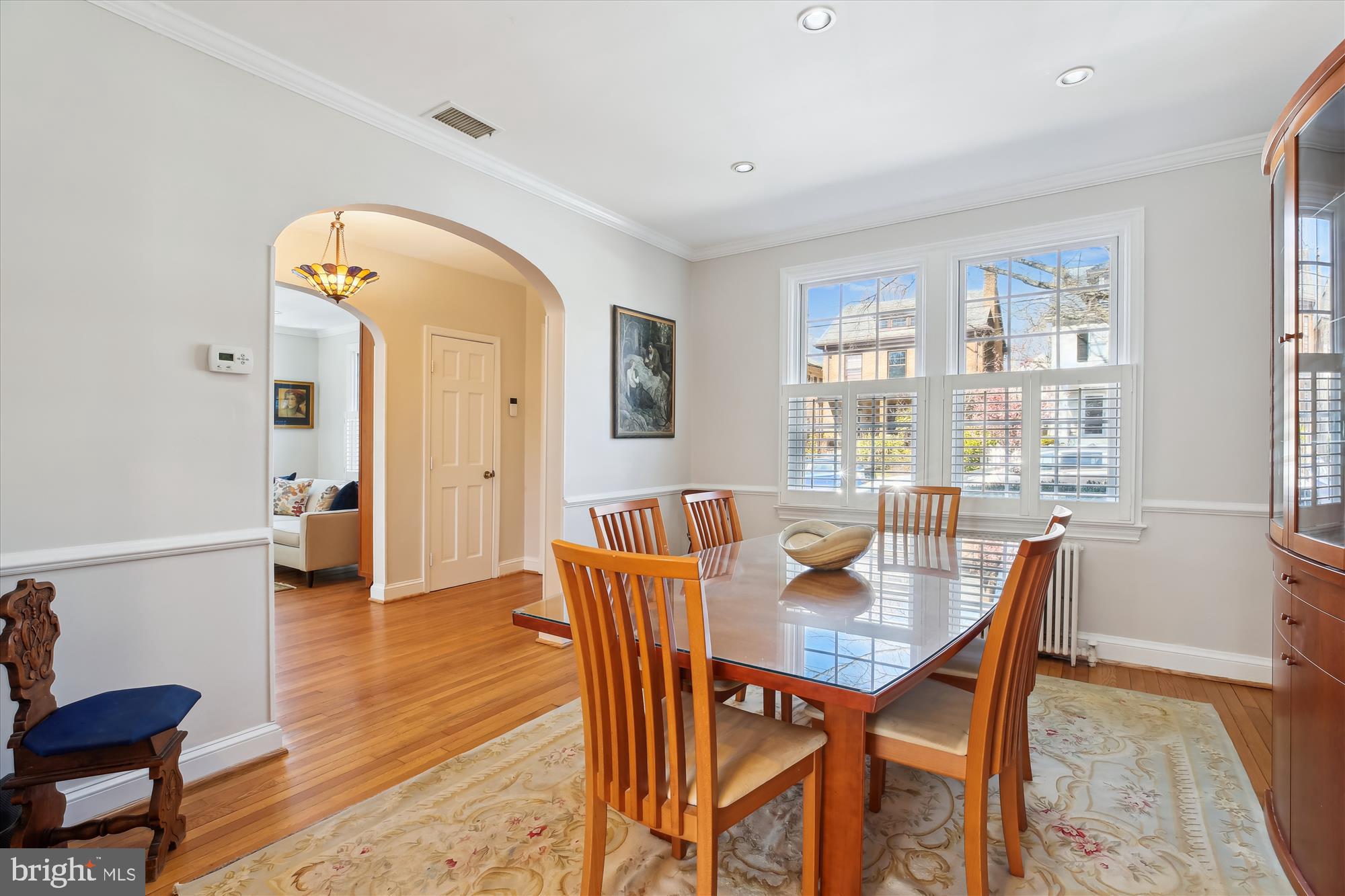 3530 Quesada Street Northwest Washington, DC 20015 - Photo 4 of 54 a view of a dining room with furniture and wooden floor