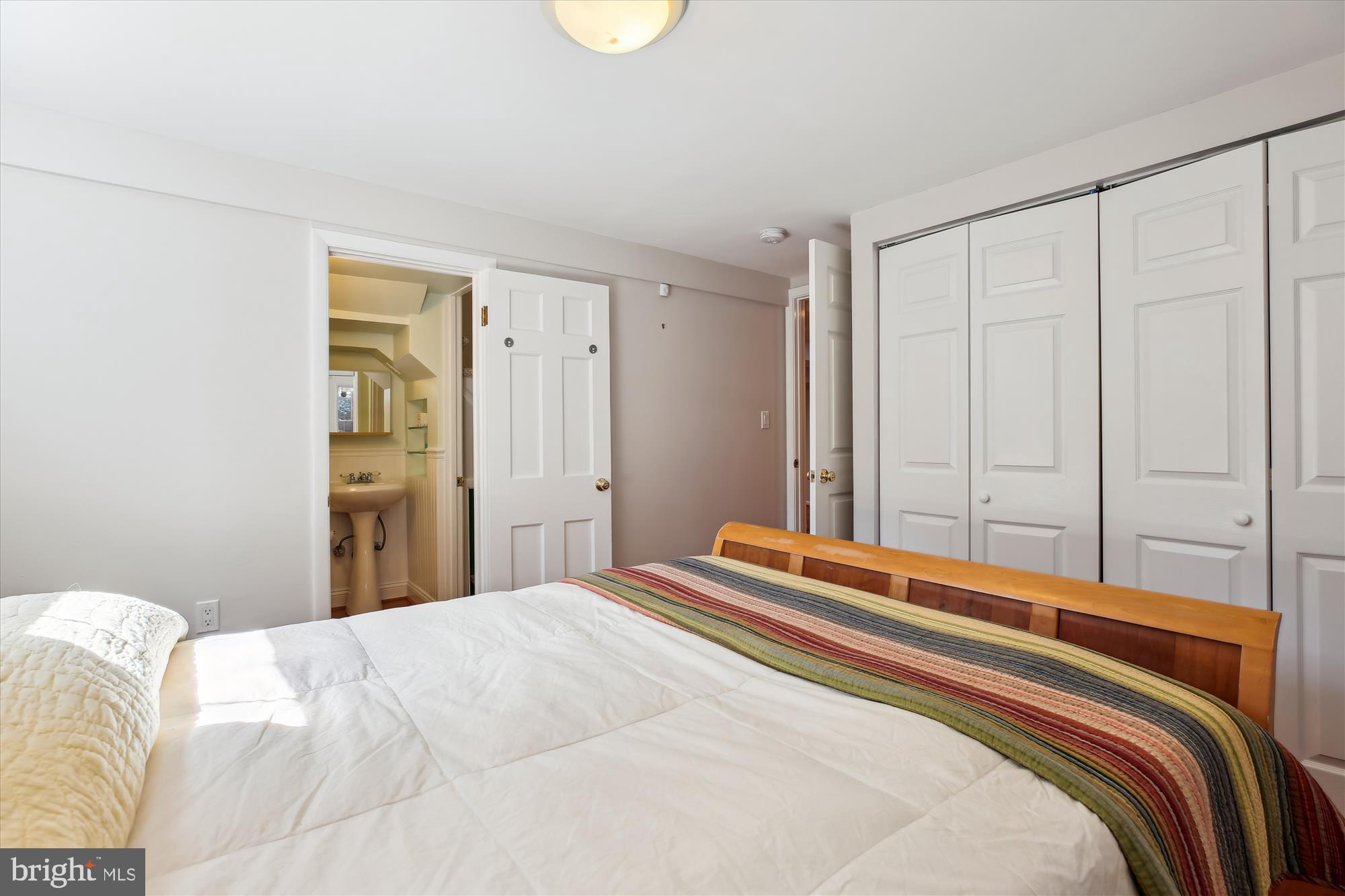 3530 Quesada Street Northwest Washington, DC 20015 - Photo 41 of 54 a bedroom with a bed and a window