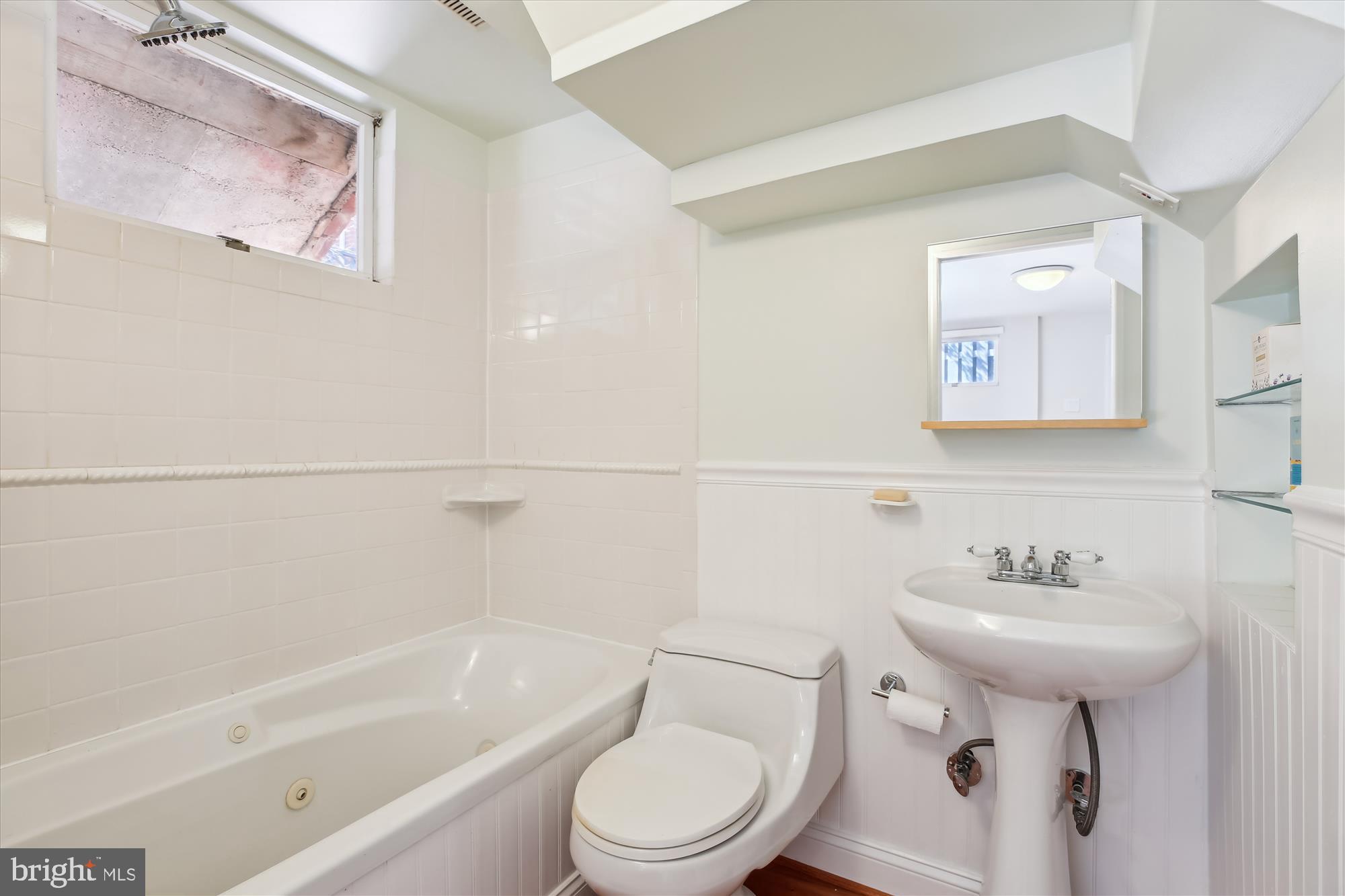 3530 Quesada Street Northwest Washington, DC 20015 - Photo 42 of 54 a bathroom with a sink toilet and bathtub