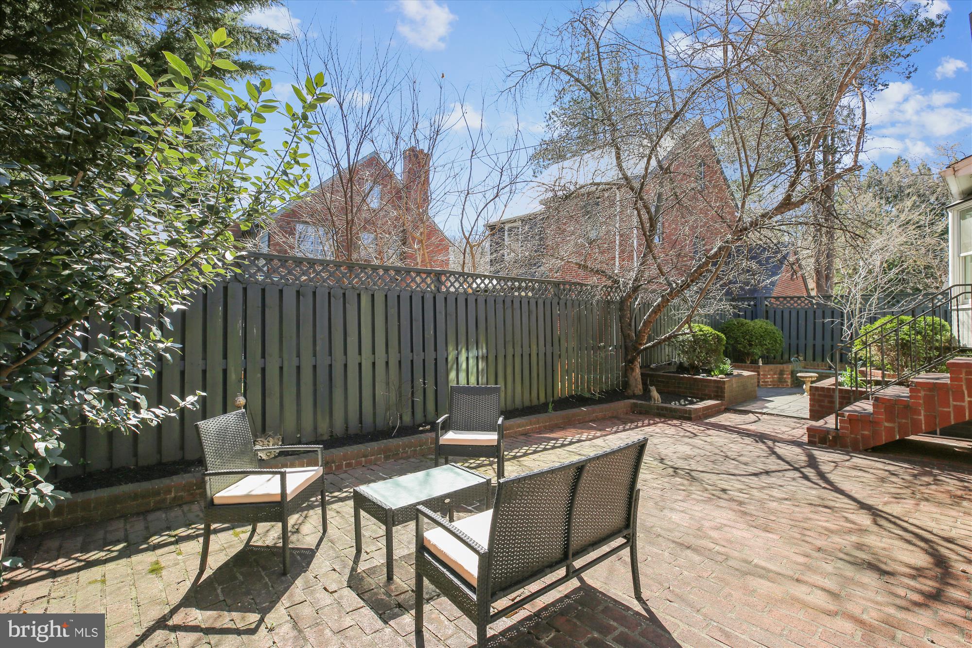 3530 Quesada Street Northwest Washington, DC 20015 - Photo 45 of 54 a view of a chairs and table in backyard