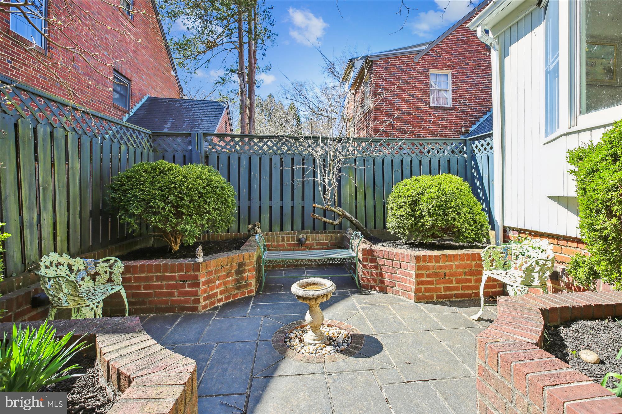 3530 Quesada Street Northwest Washington, DC 20015 - Photo 47 of 54 a view of a chairs and table in backyard of the house