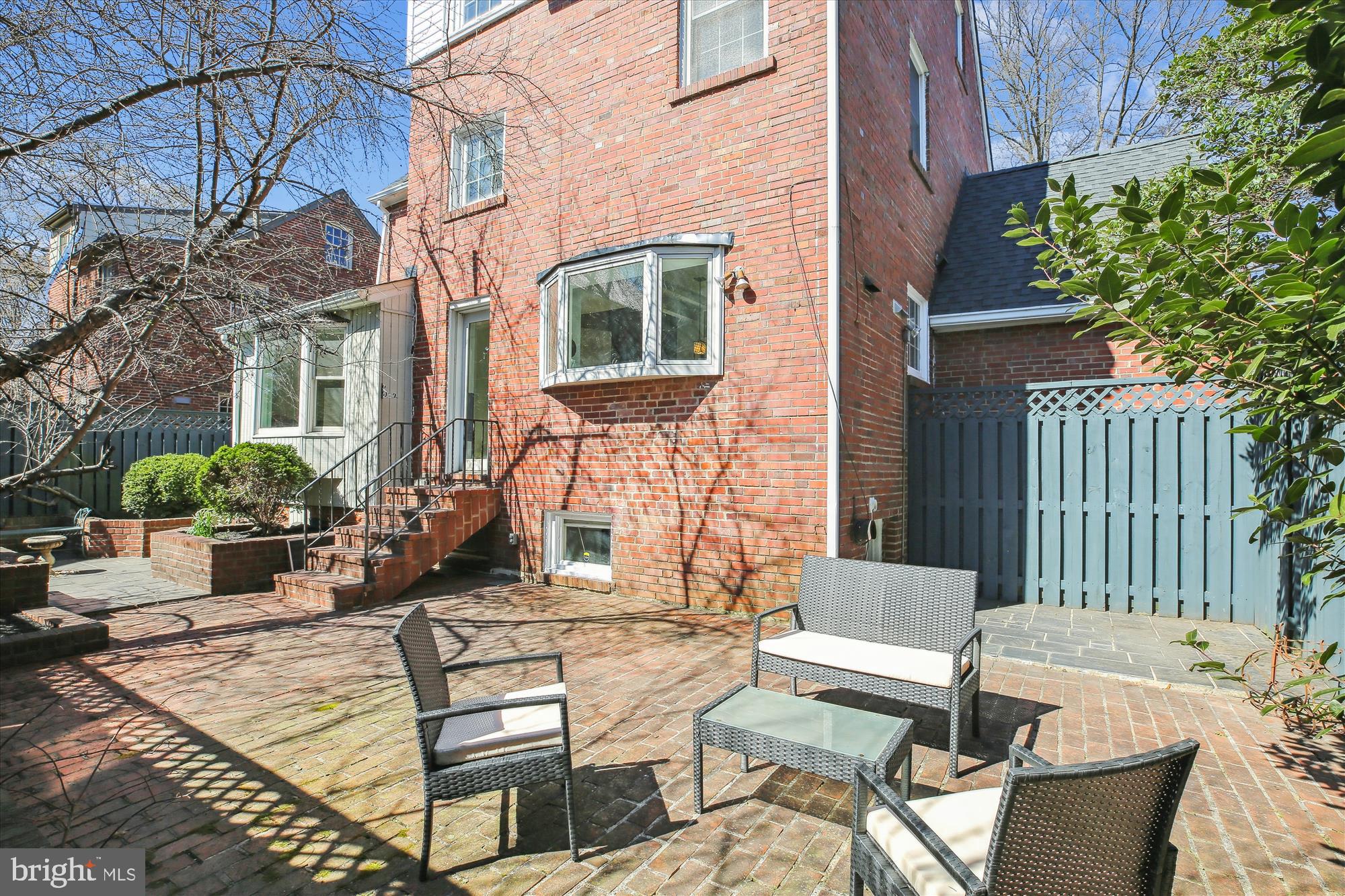 3530 Quesada Street Northwest Washington, DC 20015 - Photo 48 of 54 a view of a house with backyard and sitting area