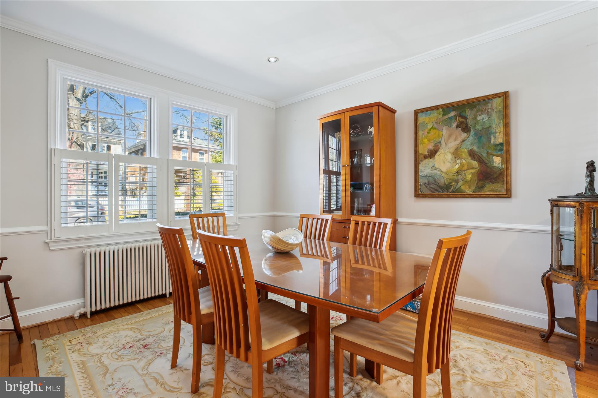 3530 Quesada Street Northwest Washington, DC 20015 - Photo 5 of 54 a view of a dining room with furniture large window and wooden floor