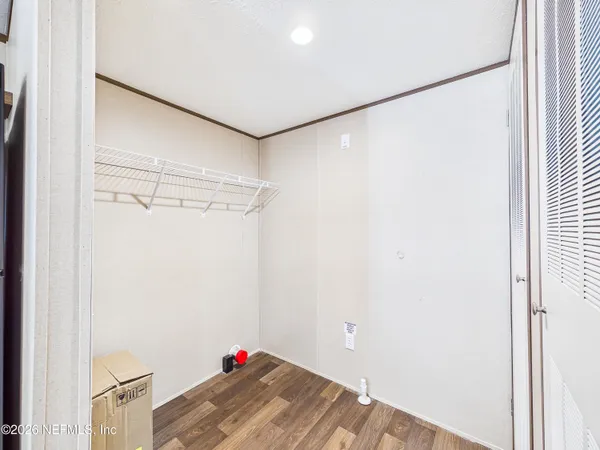 a bathroom with a shower and a shower