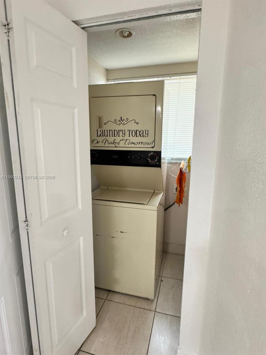 1910 Southwest 17th Avenue, Unit 4 Miami, FL 33145 - Photo 16 of 19 a utility room with dryer and washer