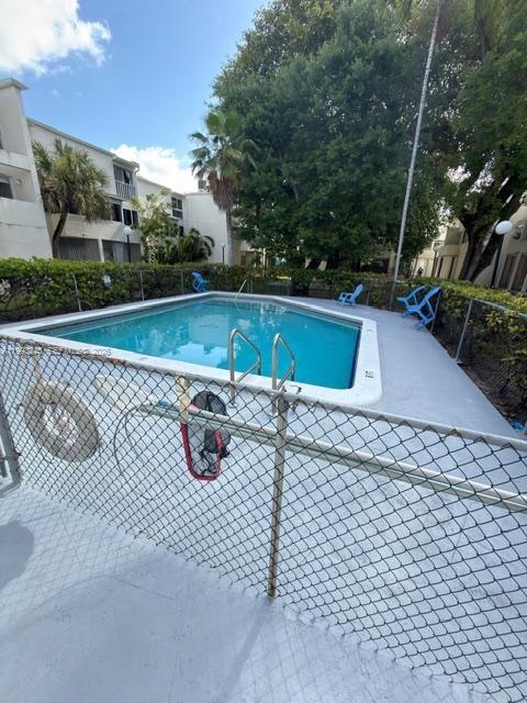 1910 Southwest 17th Avenue, Unit 4 Miami, FL 33145 - Photo 18 of 19 a view of outdoor space and deck