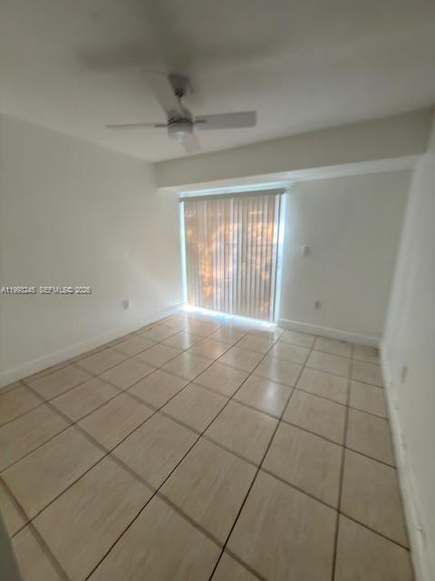 1910 Southwest 17th Avenue, Unit 4 Miami, FL 33145 - Photo 10 of 19 a view of an empty room and window