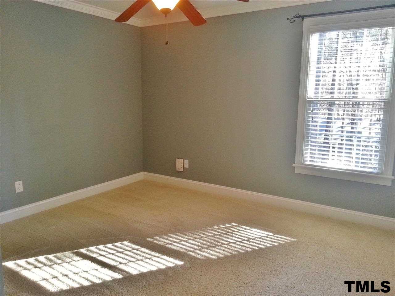 7203 Newport Avenue Raleigh, NC 27613 - Photo 11 of 24 a view of wooden floor in a room