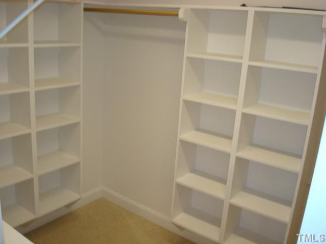 7203 Newport Avenue Raleigh, NC 27613 - Photo 20 of 24 a view of an empty walk in closet