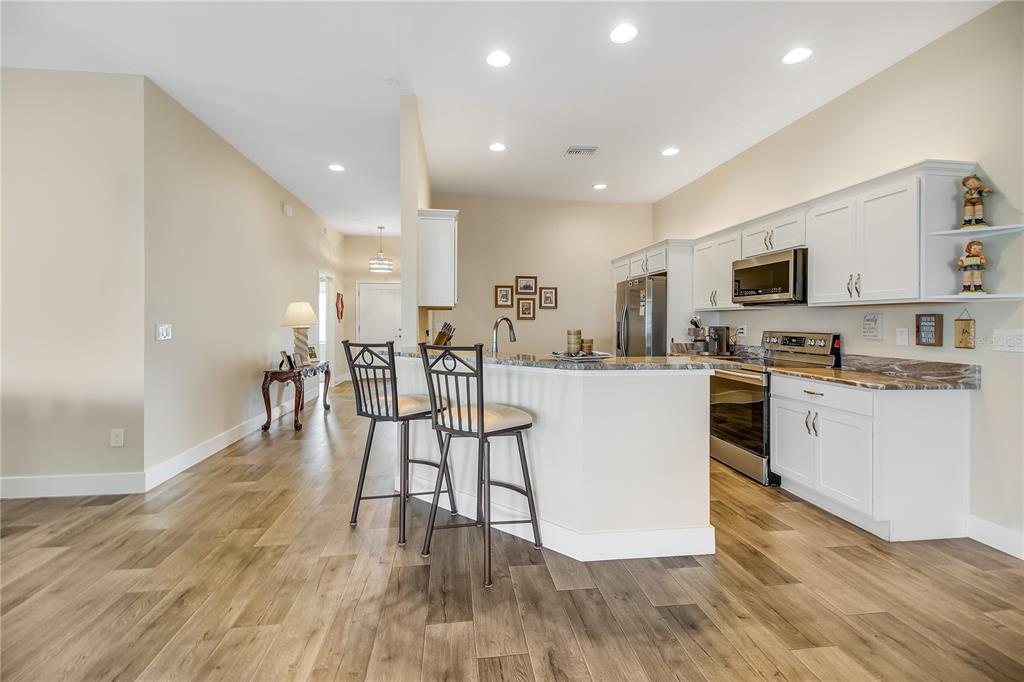 3323 Rohan Road Oxford, FL 34484 - Photo 11 of 46 a kitchen with counter space and appliances