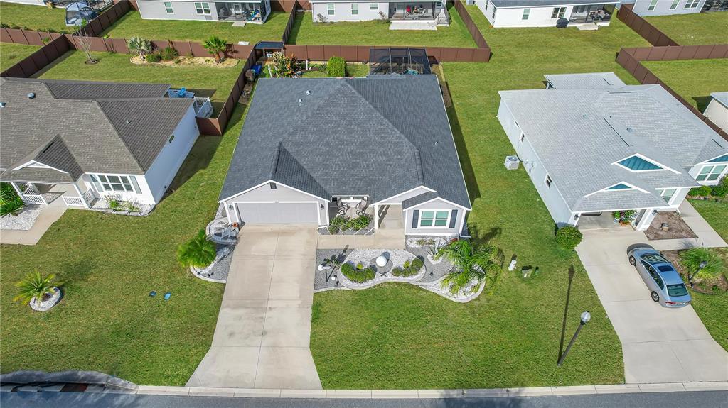 3323 Rohan Road Oxford, FL 34484 - Photo 2 of 46 an aerial view of a house with a garden