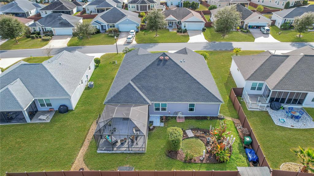 3323 Rohan Road Oxford, FL 34484 - Photo 3 of 46 an aerial view of a house with swimming pool