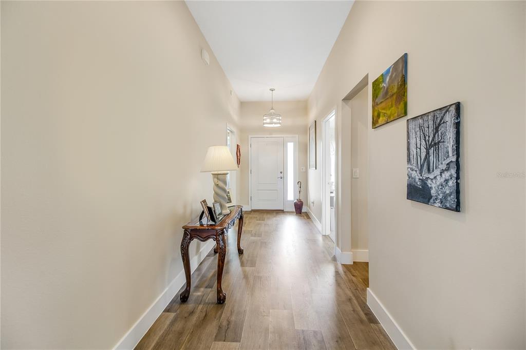 3323 Rohan Road Oxford, FL 34484 - Photo 36 of 46 a view of a hallway with wooden floor