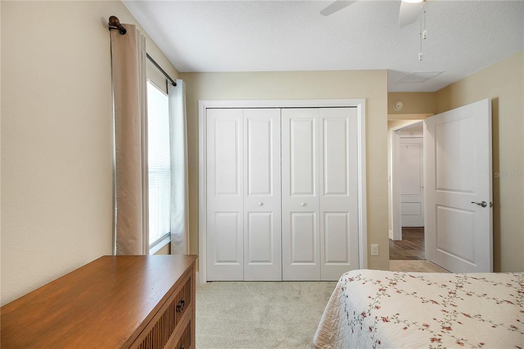 3323 Rohan Road Oxford, FL 34484 - Photo 42 of 46 a bedroom with a bed and a dresser
