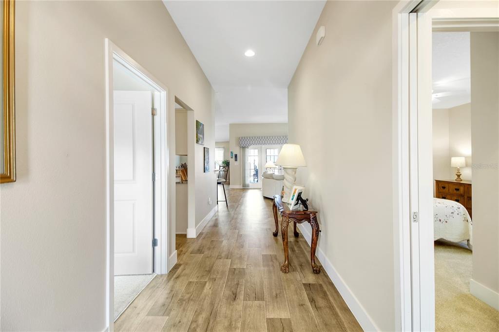 3323 Rohan Road Oxford, FL 34484 - Photo 43 of 46 a view of a hallway with a livingroom and furniture