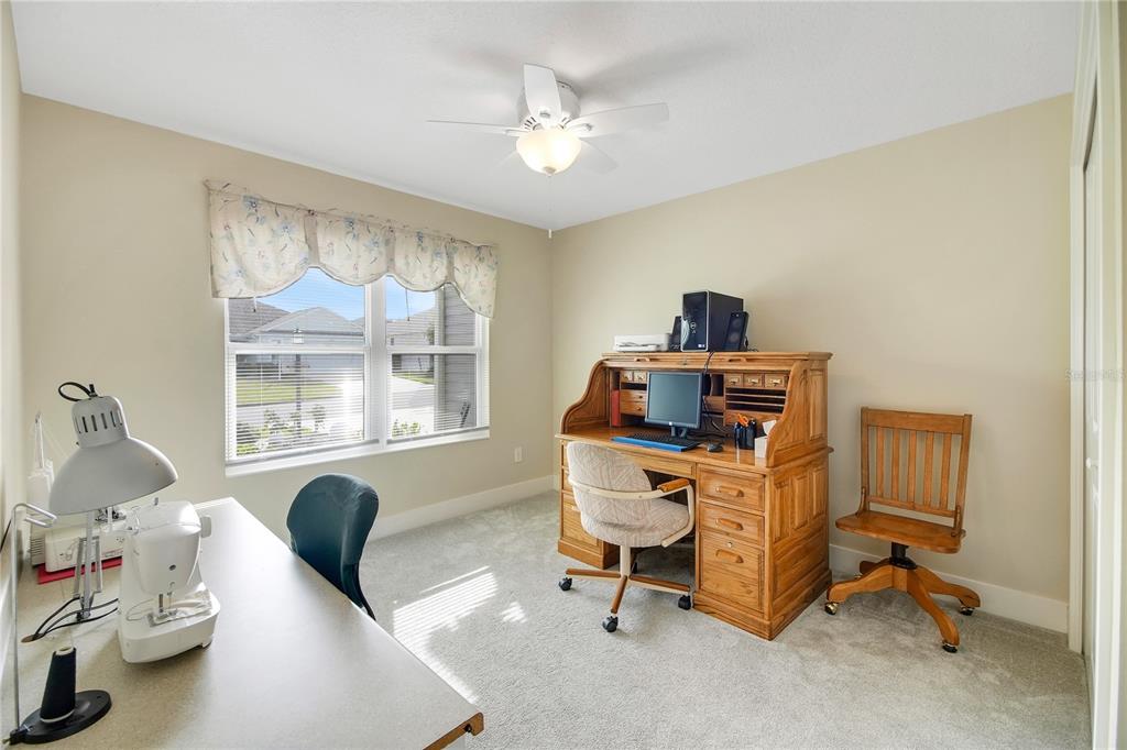 3323 Rohan Road Oxford, FL 34484 - Photo 44 of 46 a workspace with furniture and a window