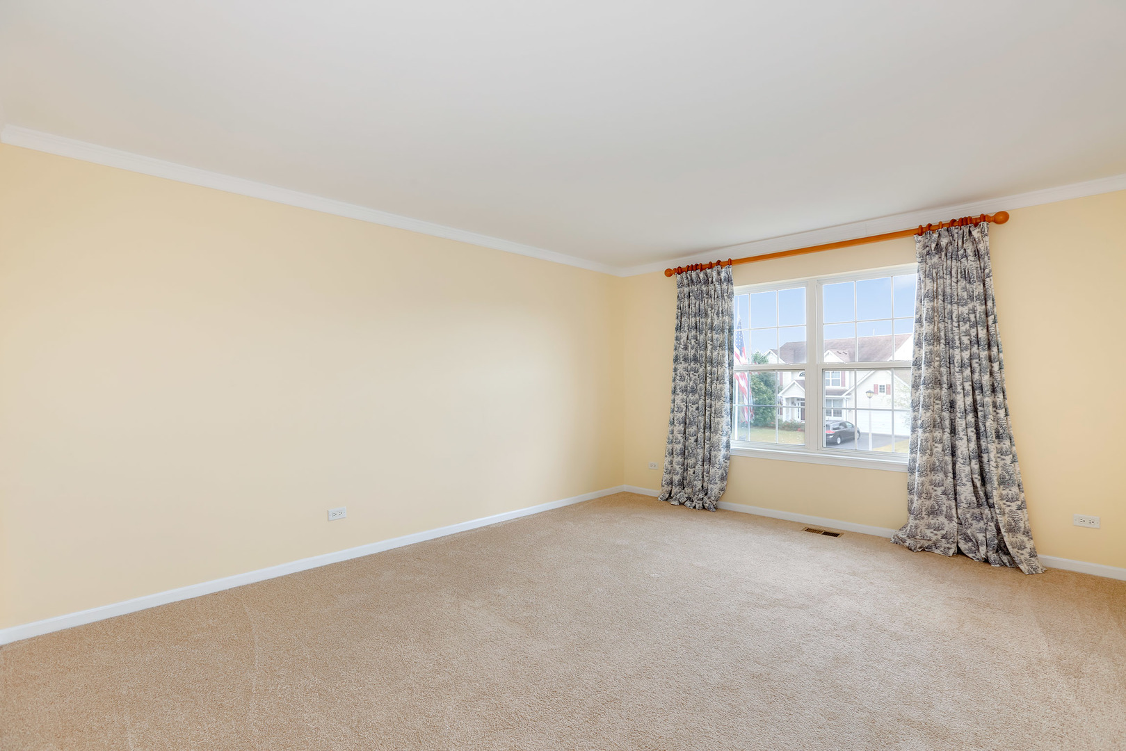 1786 Prairie Ridge Circle Lindenhurst, IL 60046 - Photo 29 of 34 a view of an empty room with a window