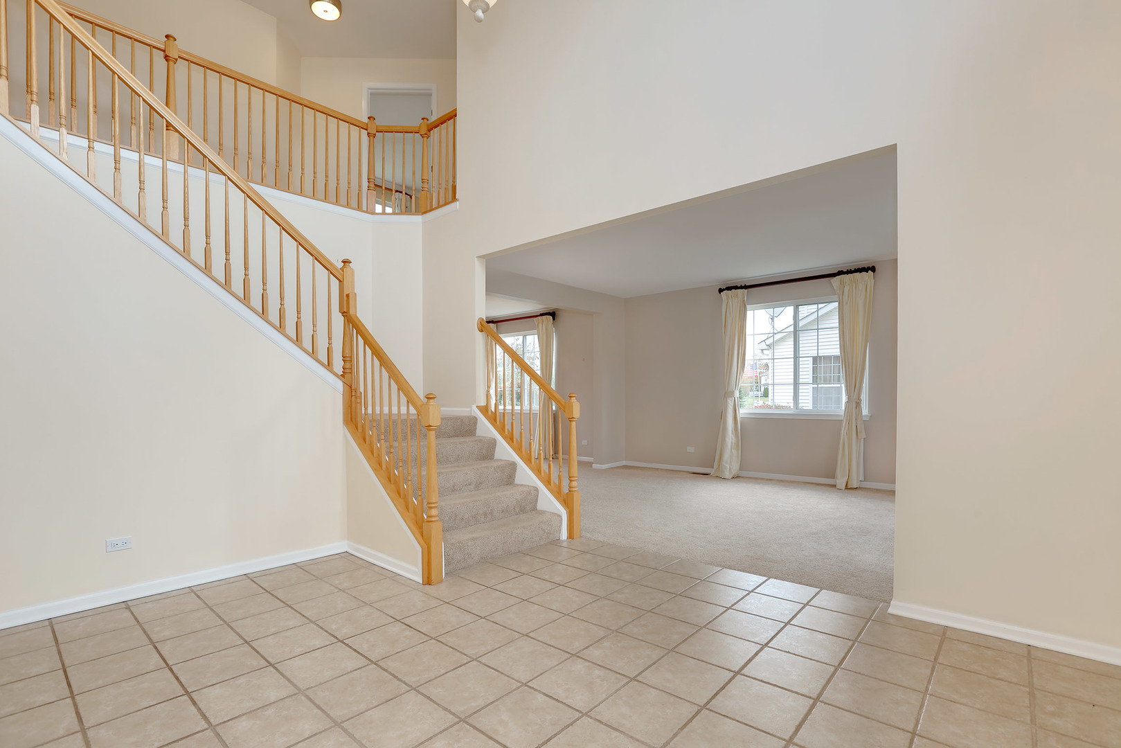 1786 Prairie Ridge Circle Lindenhurst, IL 60046 - Photo 3 of 34 a view of entryway and hall with a window