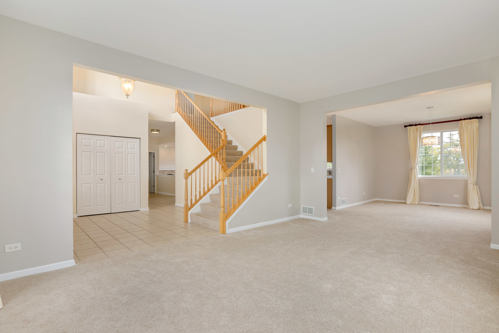 1786 Prairie Ridge Circle Lindenhurst, IL 60046 - Photo 5 of 34 a view of an empty room with a window
