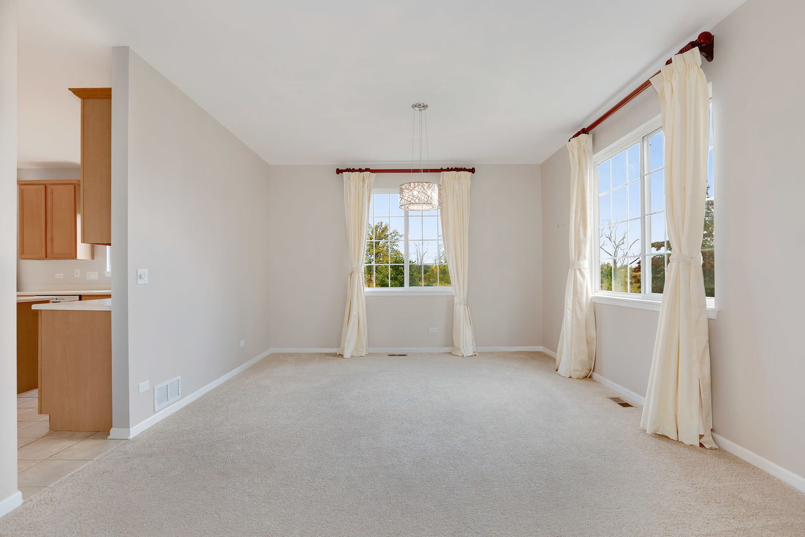 1786 Prairie Ridge Circle Lindenhurst, IL 60046 - Photo 6 of 34 a view of an empty room with a window