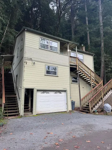 a view of a house with a garage
