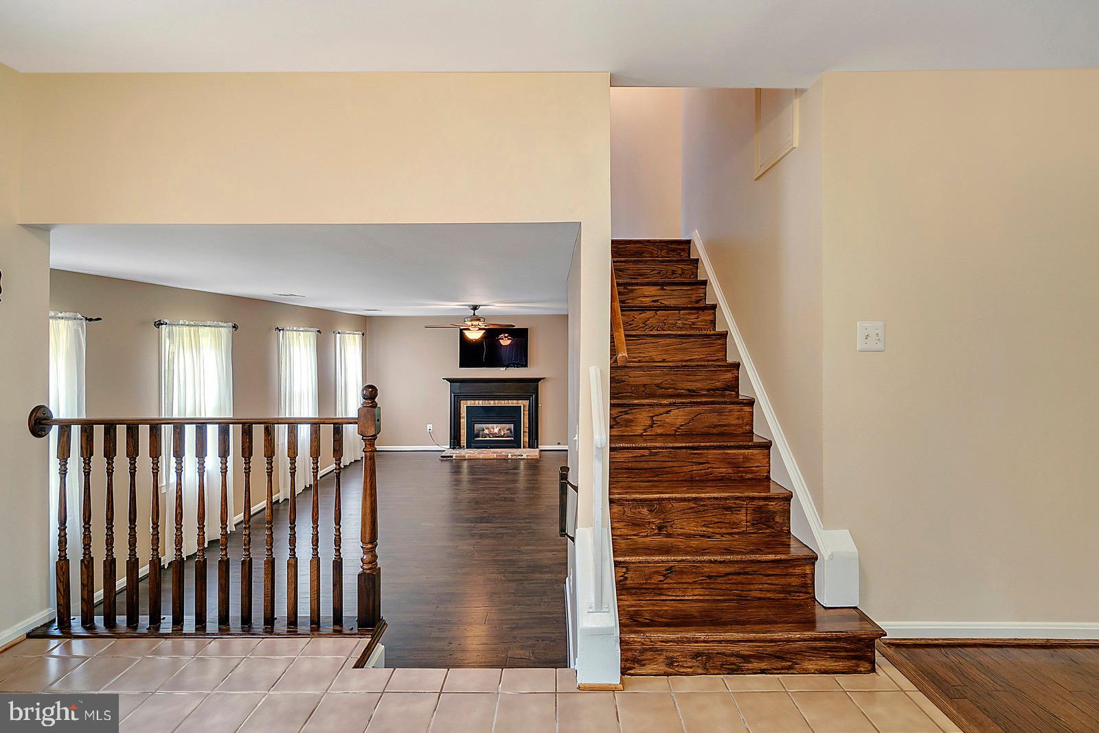 8804 Side Saddle Road Springfield, VA 22152 - Photo 3 of 37 Front Entrance Hallway Step-Down to Family Room
