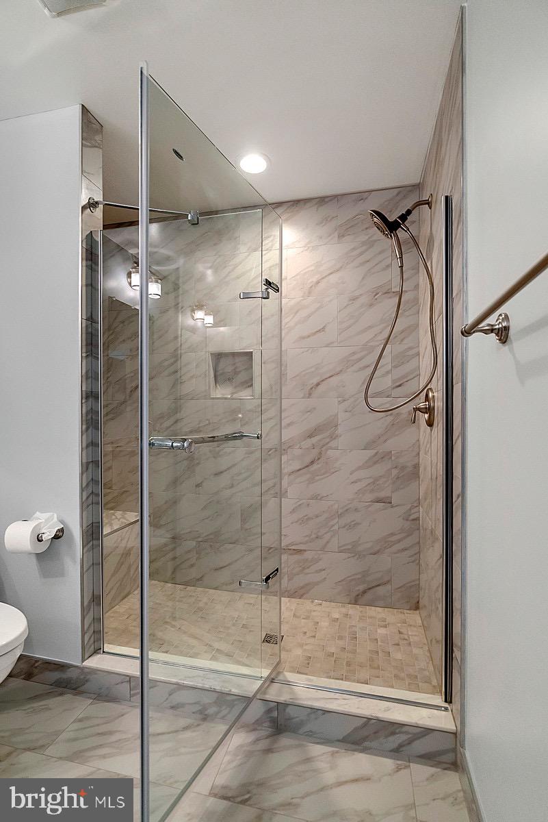 8804 Side Saddle Road Springfield, VA 22152 - Photo 21 of 37 Master Owner's Suite Tiled Shower